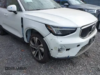 2024 Volvo XC40 Plus Bright Theme with VIN YV4L12UE2R2356332, listed as a IAAI auction lot 40734339 with 5,863 mi miles. Bid and sale history available at carsss.com. Image 6.