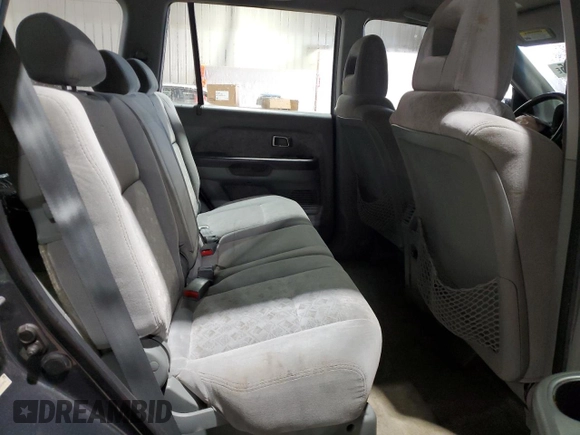 2005 Honda Pilot LX z VIN 2HKYF18175H556546, wystawiony jako Copart lot #56943435 z przebiegiem 163 377 mil mil oraz Szkoda całkowita • Salvage title. Historia ofert i sprzedaży dostępna na DreamBid. Obrazek 11.