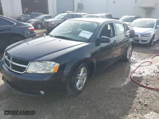 2010 Dodge Avenger R/T with VIN 1B3CC5FB3AN215209, listed as a IAAI auction lot 41676632 with 159,043 mi miles. Bid and sale history available at carsss.com. Image 2.