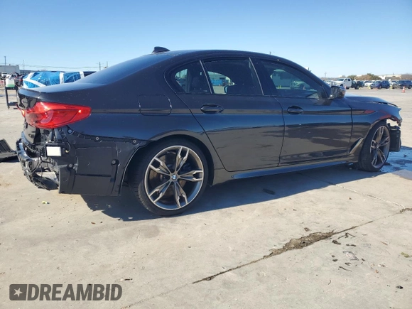 2020 BMW 5 Series M550i xDrive with VIN WBAJS7C07LCD97275, listed as a Copart auction lot 85764434 with Not provided miles and Clean title. Bid and sale history available at DreamBid. Image 3.