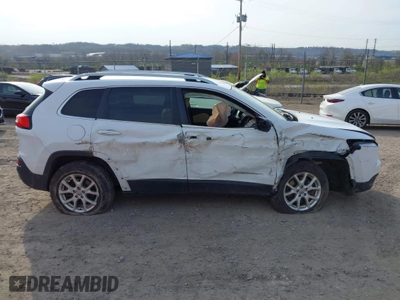 2016 Jeep Cherokee Latitude with VIN 1C4PJMCS1GW242545, listed as a IAAI auction lot 42048421 with 84,667 mi miles and . Bid and sale history available at carsss.com. Image 14.