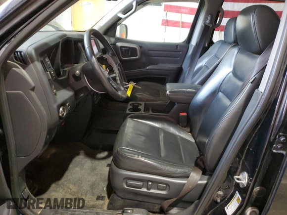 2013 Honda Ridgeline RTL with VIN 5FPYK1F57DB008861, listed as a Copart auction lot 55998335 with 226,567 mi miles and Salvage title. Bid and sale history available at DreamBid. Image 7.