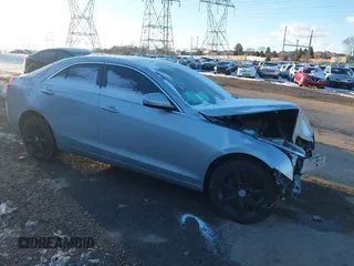 2016 Cadillac ATS Standard AWD z VIN 1G6AG5RXXG0139885, wystawiony jako IAAI lot #41280843 z przebiegiem Nie podano mil oraz . Historia ofert i sprzedaży dostępna na DreamBid. Obrazek 1.