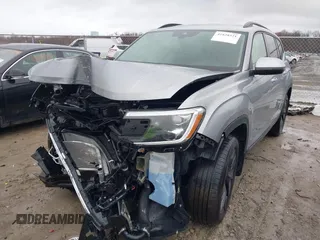 2024 Volkswagen Atlas SE with VIN 1V2HR2CA4RC593252, listed as a IAAI auction lot 41828371 with 7,317 mi miles and . Bid and sale history available at DreamBid. Image 2.