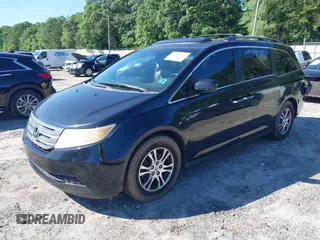 2011 Honda Odyssey EX-L with VIN 5FNRL5H67BB087064, listed as a IAAI auction lot 42326427 with 177,795 mi miles and . Bid and sale history available at DreamBid. Image 17.