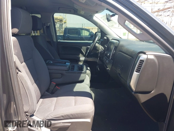 2018 Chevrolet Silverado 1500 LT with VIN 3GCUKREC1JG511846, listed as a IAAI auction lot 42024170 with 121,532 mi miles and . Bid and sale history available at DreamBid. Image 5.