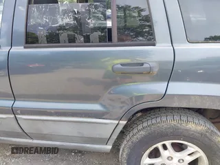 2002 Jeep Grand Cherokee Laredo with VIN 1J4GW48S92C150162, listed as a IAAI auction lot 42471732 with 171,677 mi miles and . Bid and sale history available at DreamBid. Image 14.