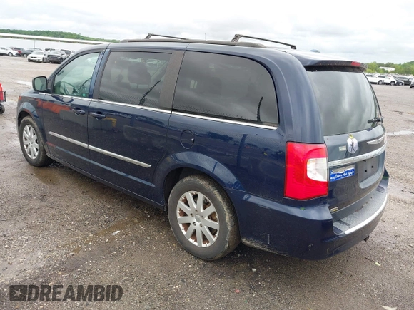 2015 Chrysler Town & Country Touring with VIN 2C4RC1BG3FR716002, listed as a IAAI auction lot 42139802 with 182,830 mi miles and . Bid and sale history available at DreamBid. Image 3.
