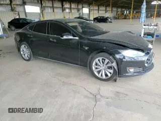 2014 Tesla Model S 60 z VIN 5YJSA1H11EFP36480, wystawiony jako Copart lot #71210254 z przebiegiem 121 014 mil mil oraz Szkoda całkowita • Salvage title. Historia ofert i sprzedaży dostępna na DreamBid. Obrazek 10.