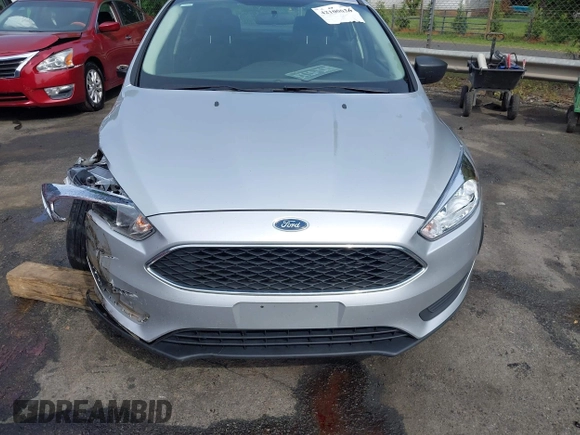 2017 Ford Focus S z VIN 1FADP3E21HL241557, wystawiony jako IAAI lot #42100036 z przebiegiem 106 764 mil mil oraz . Historia ofert i sprzedaży dostępna na DreamBid. Obrazek 17.