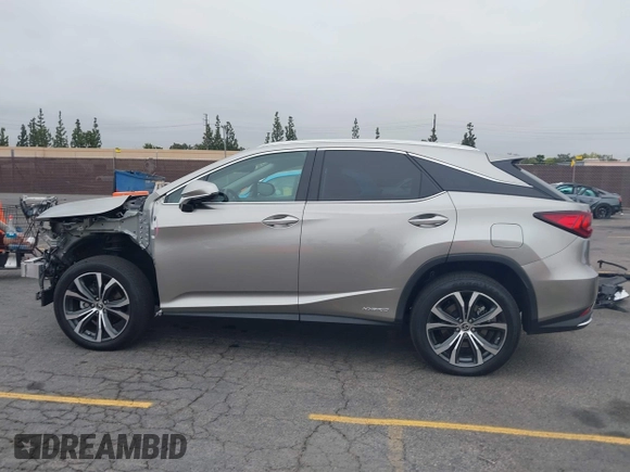 2021 Lexus RX 450h with VIN 2T2HGMDA3MC060208, listed as a IAAI auction lot 42163455 with 34,167 mi miles and . Bid and sale history available at DreamBid. Image 15.