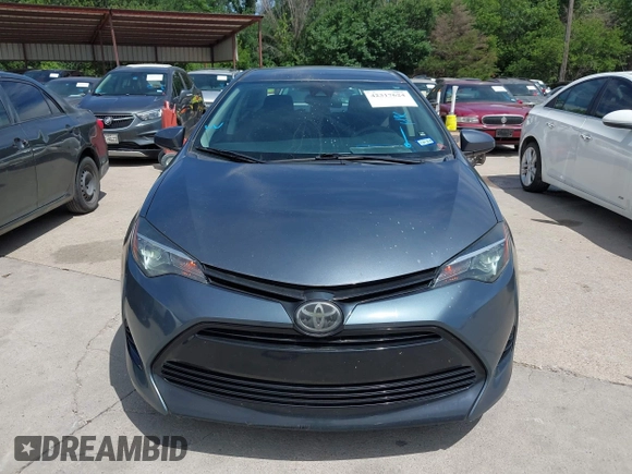 2018 Toyota Corolla L z VIN 5YFBURHE4JP820560, wystawiony jako IAAI lot #42317624 z przebiegiem 84 946 mil mil oraz . Historia ofert i sprzedaży dostępna na DreamBid. Obrazek 6.