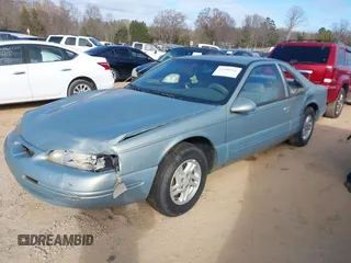 1997 Ford Thunderbird LX with VIN 1FALP6242VH127682, listed as a IAAI auction lot 41088946 with 88,769 mi miles and . Bid and sale history available at DreamBid. Image 2.