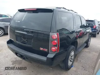 2009 GMC Yukon SLT w/4SA with VIN 1GKFC33J39R295065, listed as a IAAI auction lot 41514132 with 216,680 mi miles. Bid and sale history available at carsss.com. Image 4.