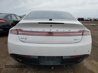 2014 Lincoln MKZ z VIN 3LN6L2G93ER811683, wystawiony jako Copart lot #52004485 z przebiegiem 188 134 mil mil oraz Szkoda całkowita • Salvage title. Historia ofert i sprzedaży dostępna na DreamBid. Obrazek 6.