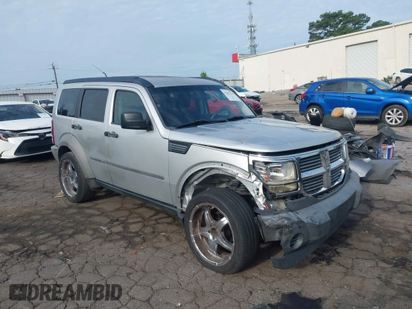 2007 Dodge Nitro SXT with VIN 1D8GU28K37W562598, listed as a IAAI auction lot 42491176 with 202,676 mi miles and . Bid and sale history available at DreamBid. Image 1.