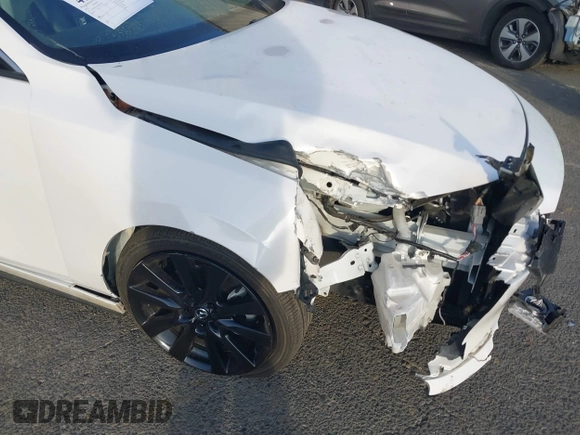2022 Mazda 3 2.5 Turbo with VIN 3MZBPBAY2NM311824, listed as a IAAI auction lot 41038030 with 21,669 mi miles and . Bid and sale history available at DreamBid. Image 19.