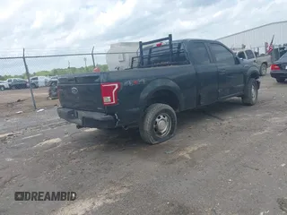 2015 Ford F-150 XLT with VIN 1FTFX1EF2FFB71167, listed as a IAAI auction lot 41947482 with Not Provided miles and . Bid and sale history available at DreamBid. Image 4.
