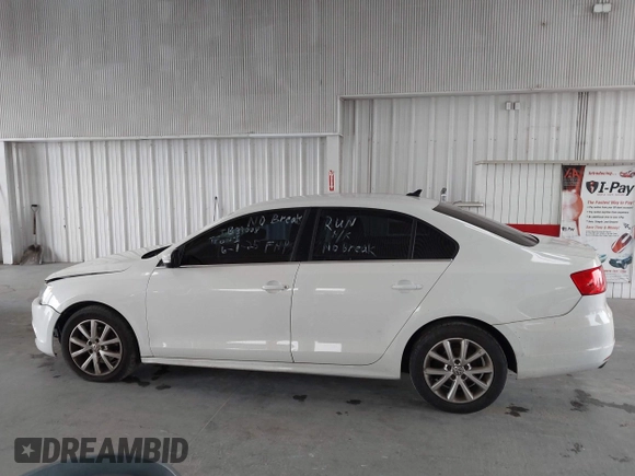 2014 Volkswagen Jetta SE z VIN 3VWD17AJ3EM265396, wystawiony jako IAAI lot #42434771 z przebiegiem 114 931 mil mil oraz . Historia ofert i sprzedaży dostępna na DreamBid. Obrazek 14.