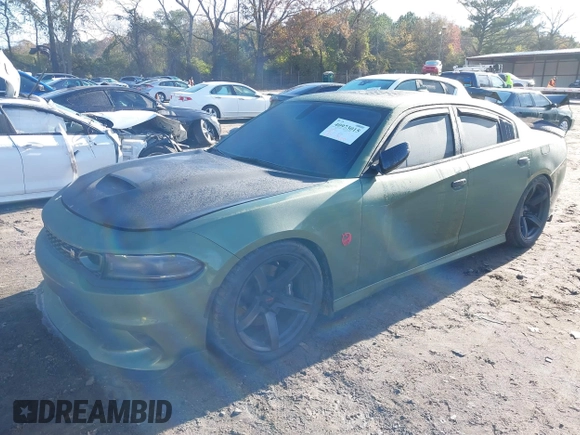 2019 Dodge Charger Scat Pack with VIN 2C3CDXGJ4KH572619, listed as a IAAI auction lot 40973015 with 40,148 mi miles and . Bid and sale history available at DreamBid. Image 18.