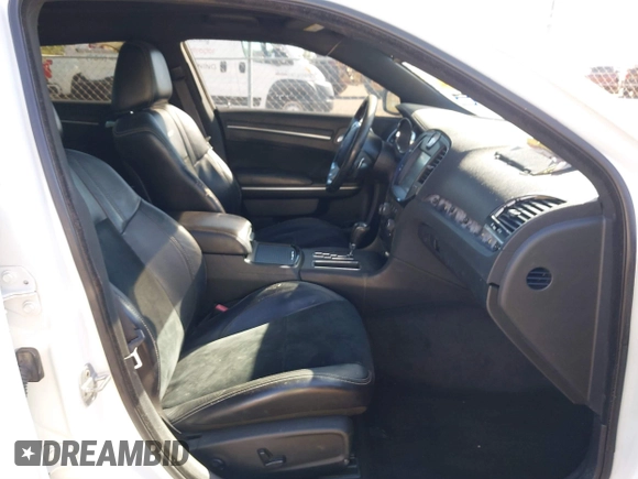 2012 Chrysler 300 SRT-8 with VIN 2C3CCAFJ9CH801749, listed as a IAAI auction lot 40912606 with 144,404 mi miles and . Bid and sale history available at DreamBid. Image 5.