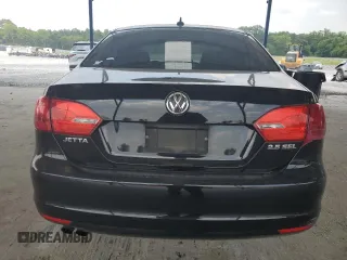 2012 Volkswagen Jetta SEL with VIN 3VWLX7AJ2CM409477, listed as a Copart auction lot 59476915 with 156,035 mi miles and Salvage title. Bid and sale history available at DreamBid. Image 6.