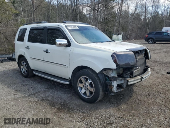 2011 Honda Pilot Touring with VIN 5FNYF4H9XBB501591, listed as a Copart auction lot 53694265 with 244,844 mi miles and Salvage Title. Bid and sale history available at DreamBid. Image 4.