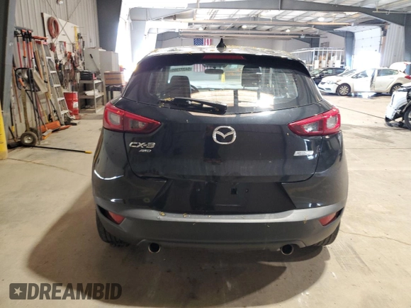 2017 Mazda CX-3 Grand Touring z VIN JM1DKFD71H0141595, wystawiony jako Copart lot #54377305 z przebiegiem 60 907 mil mil oraz Szkody całkowita. Historia ofert i sprzedaży dostępna na DreamBid. Obrazek 6.