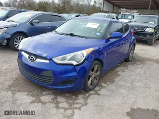 2012 Hyundai Veloster w/Gray Int with VIN KMHTC6ADXCU065990, listed as a IAAI auction lot 41736250 with 126,281 mi miles. Bid and sale history available at carsss.com. Image 2.