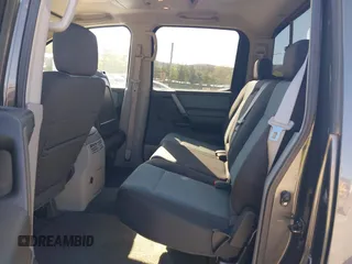 2004 Nissan Titan LE with VIN 1N6AA07B24N574789, listed as a IAAI auction lot 42039183 with 147,691 mi miles. Bid and sale history available at carsss.com. Image 8.