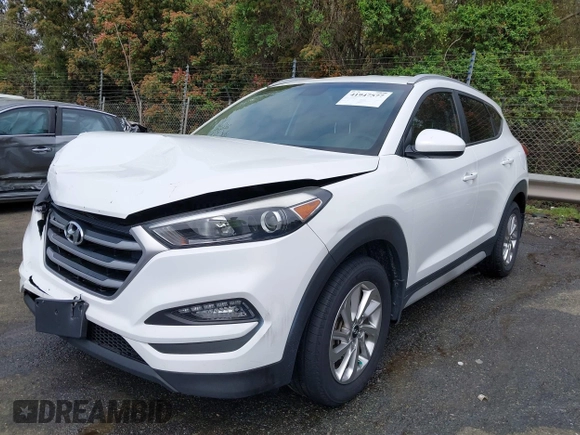 2017 Hyundai Tucson SE z VIN KM8J33A40HU383601, wystawiony jako IAAI lot #41947577 z przebiegiem 92 722 mil mil oraz . Historia ofert i sprzedaży dostępna na DreamBid. Obrazek 2.