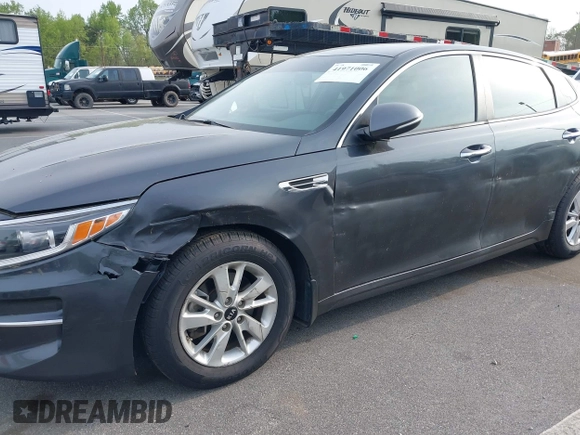 2016 Kia Optima LX with VIN KNAGT4L33G5107444, listed as a IAAI auction lot 41971006 with 174,997 mi miles. Bid and sale history available at carsss.com. Image 6.