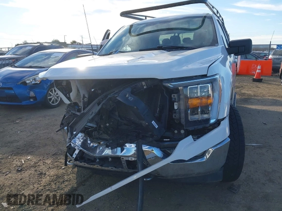 2021 Ford F-150 XL z VIN 1FTFW1E84MFB69972, wystawiony jako IAAI lot #41294390 z przebiegiem 60 336 mil mil oraz . Historia ofert i sprzedaży dostępna na DreamBid. Obrazek 12.