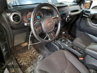 2014 Jeep Wrangler Sport with VIN 1C4AJWAG5EL307945, listed as a Copart auction lot 60152035 with 119,508 mi miles and Salvage title. Bid and sale history available at DreamBid. Image 8.