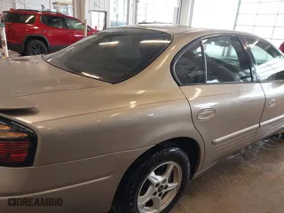 2002 Pontiac Bonneville SE with VIN 1G2HX54K424128538, listed as a IAAI auction lot 41606130 with 147,048 mi miles. Bid and sale history available at carsss.com. Image 14.