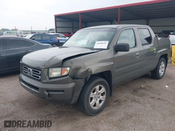 2007 Honda Ridgeline RTL with VIN 2HJYK16517H513832, listed as a IAAI auction lot 42626411 with 209,171 mi miles and . Bid and sale history available at DreamBid. Image 17.