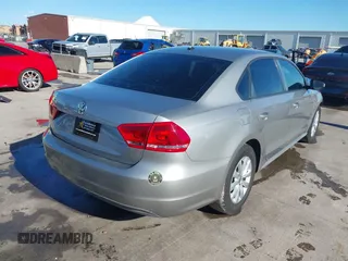 2012 Volkswagen Passat S w/Appearance with VIN 1VWAP7A34CC014601, listed as a IAAI auction lot 41199556 with 139,815 mi miles. Bid and sale history available at carsss.com. Image 4.