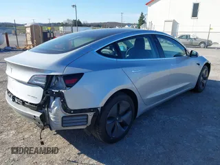 2018 Tesla Model 3 Long Range Battery with VIN 5YJ3E1EB9JF065057, listed as a IAAI auction lot 41863903 with 54,584 mi miles and . Bid and sale history available at DreamBid. Image 4.