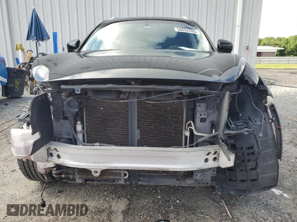 2013 Infiniti FX with VIN JN8CS1MU0DM140661, listed as a Copart auction lot 56652205 with Not provided miles and Salvage title. Bid and sale history available at DreamBid. Image 5.
