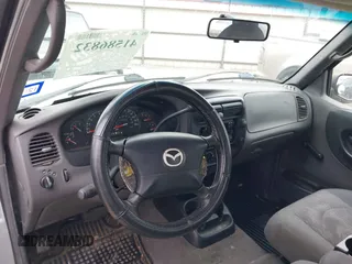 2003 Mazda B-Series 2WD Truck DS with VIN 4F4YR16V93TM16379, listed as a IAAI auction lot 41586832 with 147,300 mi miles. Bid and sale history available at carsss.com. Image 13.