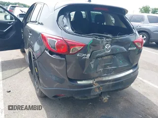 2016 Mazda CX-5 Touring z VIN JM3KE4CY4G0692655, wystawiony jako IAAI lot #42318657 z przebiegiem 212 826 mil mil oraz . Historia ofert i sprzedaży dostępna na DreamBid. Obrazek 6.