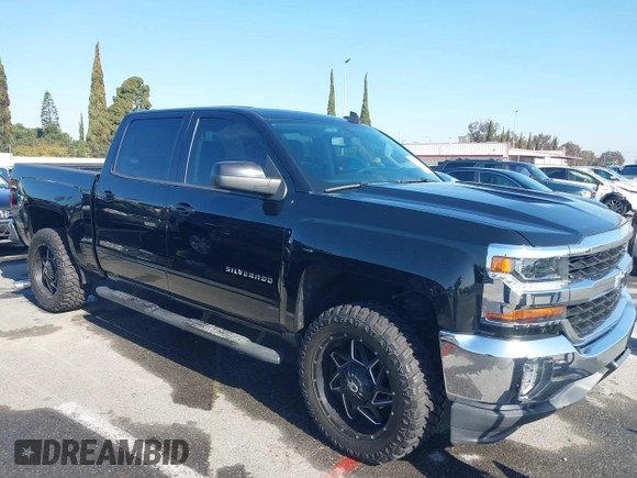 2017 Chevrolet Silverado 1500 LT with VIN 3GCPCREC5HG471758, listed as a IAAI auction lot 41991708 with 77,056 mi miles. Bid and sale history available at carsss.com. Image 13.