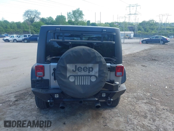 2014 Jeep Wrangler Unlimited Sport with VIN 1C4BJWDG6EL194359, listed as a IAAI auction lot 42182236 with 134,889 mi miles and . Bid and sale history available at DreamBid. Image 16.