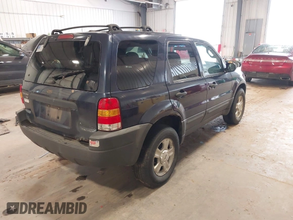 2004 Ford Escape XLT with VIN 1FMYU93134KB36712, listed as a IAAI auction lot 42412101 with 232,340 mi miles and . Bid and sale history available at DreamBid. Image 4.