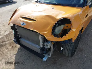 2015 MINI Hardtop 4 Door S z VIN WMWXU3C51F2B57061, wystawiony jako IAAI lot #41691431 z przebiegiem 66 406 mil mil oraz . Historia ofert i sprzedaży dostępna na DreamBid. Obrazek 6.