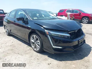 2018 Honda Clarity Plug-In Hybrid Touring with VIN JHMZC5F33JC011358, listed as a IAAI auction lot 42010720 with 61,366 mi miles. Bid and sale history available at carsss.com. Image 1.