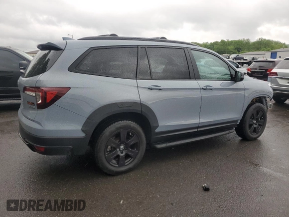 2022 Honda Pilot TrailSport z VIN 5FNYF6H81NB020409, wystawiony jako Copart lot #56401885 z przebiegiem 28 744 mil mil oraz Szkoda całkowita • Salvage title. Historia ofert i sprzedaży dostępna na DreamBid. Obrazek 3.