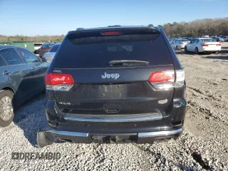 2015 Jeep Grand Cherokee Summit with VIN 1C4RJFJG0FC700014, listed as a Copart auction lot 42981765 with 144,937 mi miles and Salvage Title. Bid and sale history available at DreamBid. Image 6.