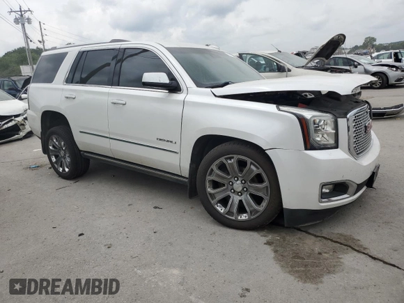 2016 GMC Yukon Denali with VIN 1GKS2CKJ0GR457895, listed as a Copart auction lot 63248354 with 118,005 mi miles and Salvage Title. Bid and sale history available at carsss.com. Image 4.