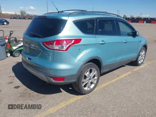 2013 Ford Escape SEL with VIN 1FMCU9HX4DUB95893, listed as a IAAI auction lot 42167435 with 142,016 mi miles. Bid and sale history available at carsss.com. Image 4.